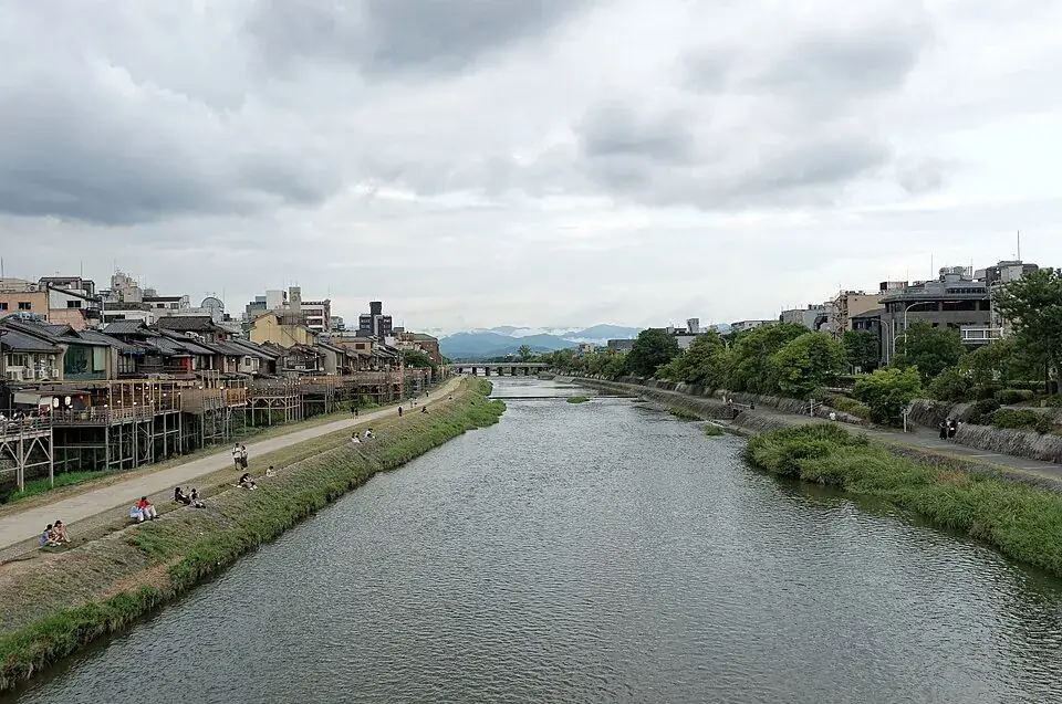 The Kamo River in Kyoto, with townhouses along its bank