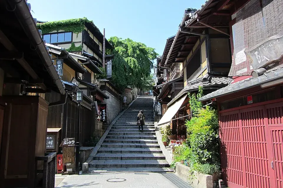 Sannenzaka’s stone steps between old wooden shops in Higashiyama